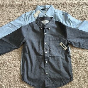 TWO BRAND NEW BUTTON DOWN BOYS SHIRTS. MEDIUM.